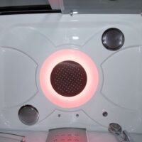 Serenity White monsoon shower head and speakers