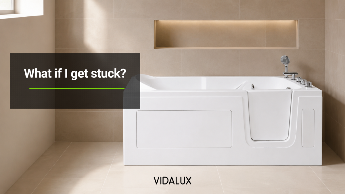 What if I get stuck? Hero image for the Vidalux article on walk-in bath safety, showing a Vidalux walk-in bath with door access in a calm British bathroom.