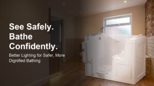 A modern residential bathroom with warm layered lighting and a walk-in bath, demonstrating safe, glare-free illumination for elderly users with visual impairment.