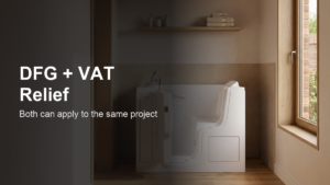 Vidalux walk-in bath with accessible step-in door, installed in a modern domestic bathroom with warm neutral walls and natural light.