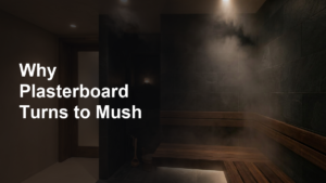 Interior of a tiled steam room with anthracite porcelain walls and light steam vapour, illustrating a correctly specified steam environment.