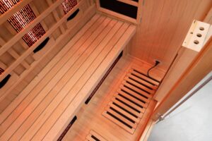 The warm glow of the infrared heaters inside a Vidalux Premier sauna