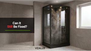 Vidalux Fusion Steam 1200 black steam shower cabin installed in a daylit, tiled UK bathroom.