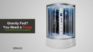 The Vidalux Miami 1050 quadrant steam shower with curved glass doors, a central control column with body jets, two hand showers and a deep white tray on a grey background.